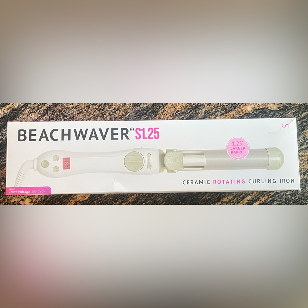 Beachwaver curling iron. S1.25
